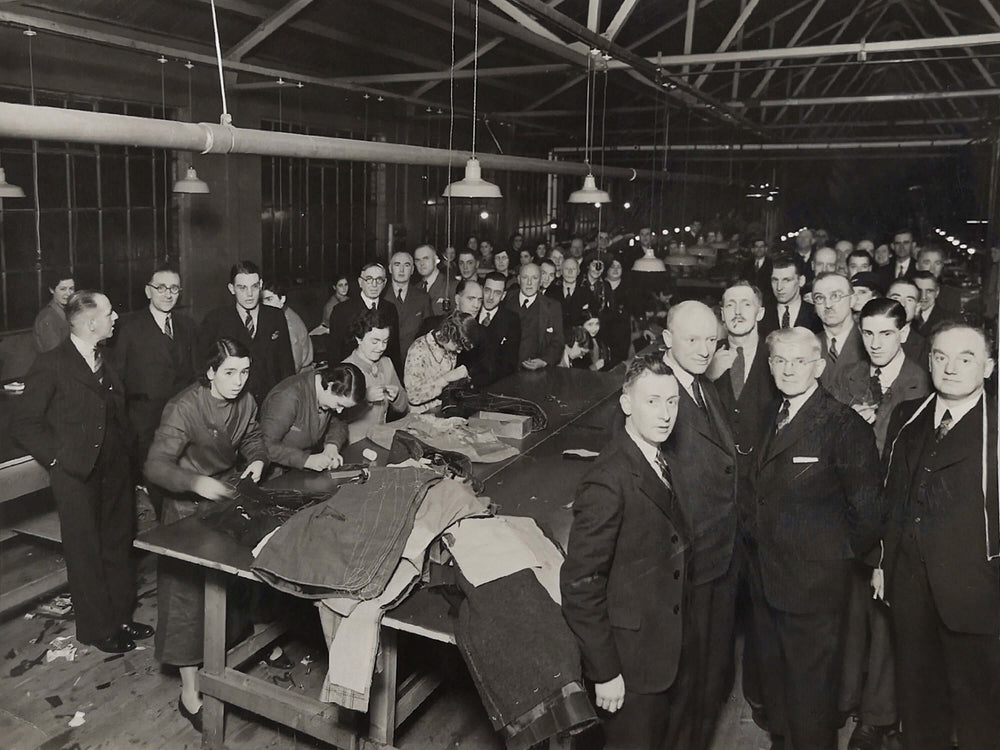 Andrew Livingston enjoying the sociable company of a crowd of bespoke tailors at a visit to a tailoring factory.

