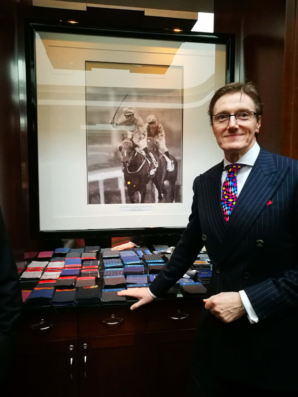 Andrew on a sales trip at the Hong Kong Jockey Club in Beijing.