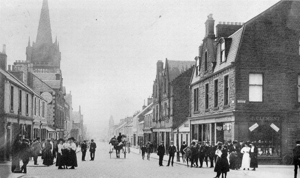 In November 1895 Alexander McAdam, a tailor in Castle Douglas, died and his widow sold his tailoring business at 96 King Street to George Livingston
No 96 can be seen on the right. It was later demolished for the building of a Post Office.